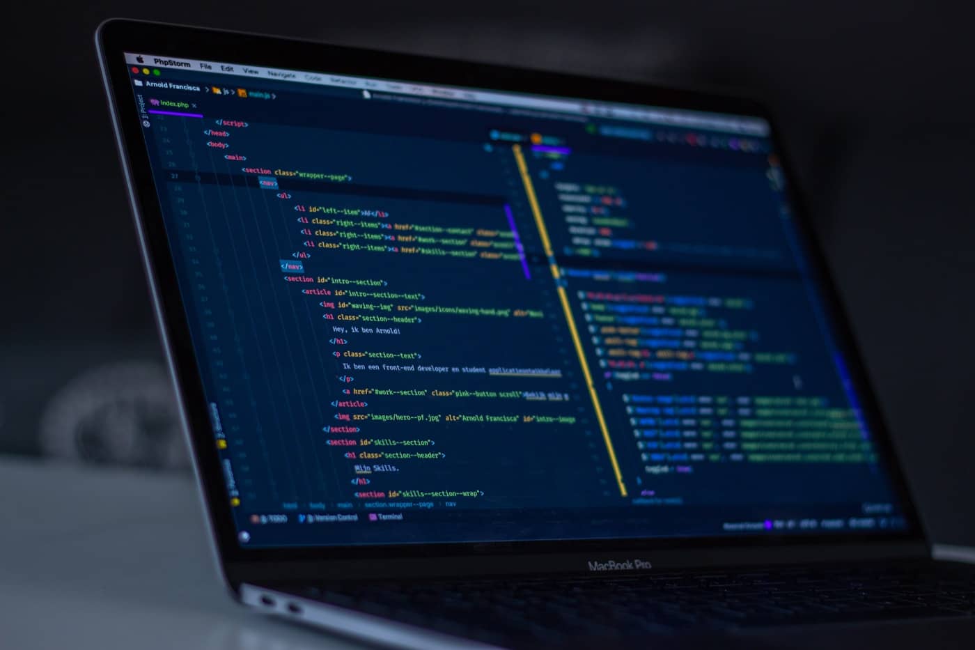 Developer workspace with code editor on multiple monitors