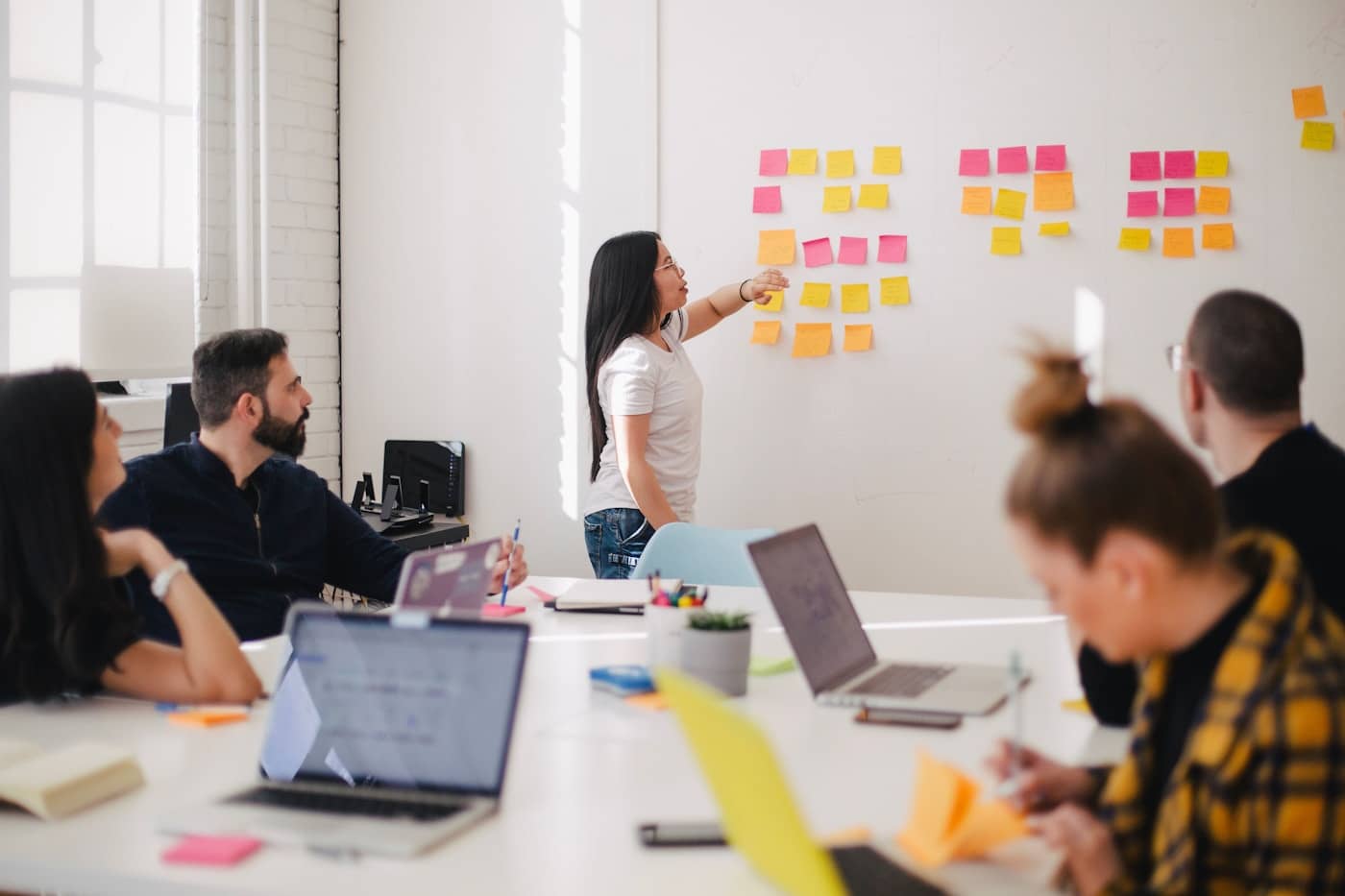 Business team discussing software solutions in a meeting